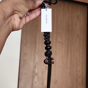 Coach Black Braided Keychain with Logo Charm